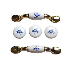 - Set of reclaimed ceramic and metal drawer pulls